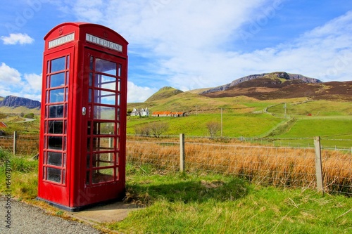 Classic red British phone booth in the countryside,Scotland