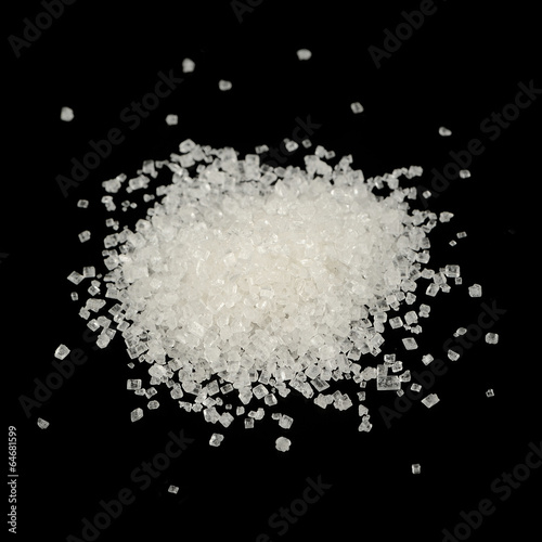 Pile of White Sugar on Black Background