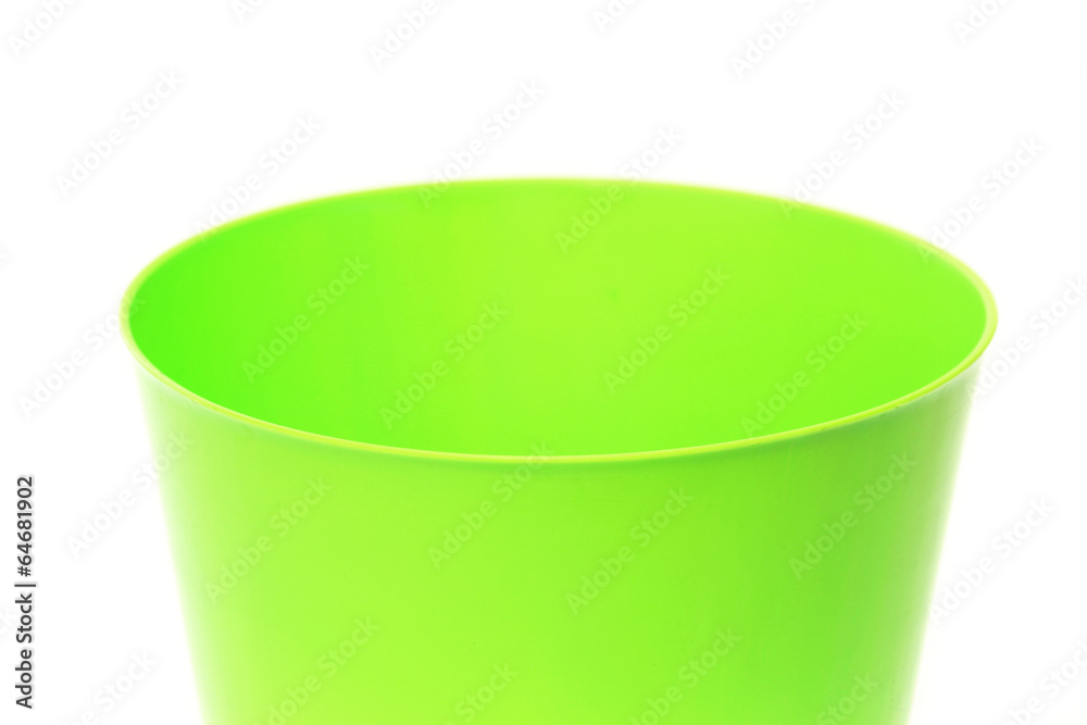 Close up of green flowerpot on a white background Close up of green flowerpot on a white background