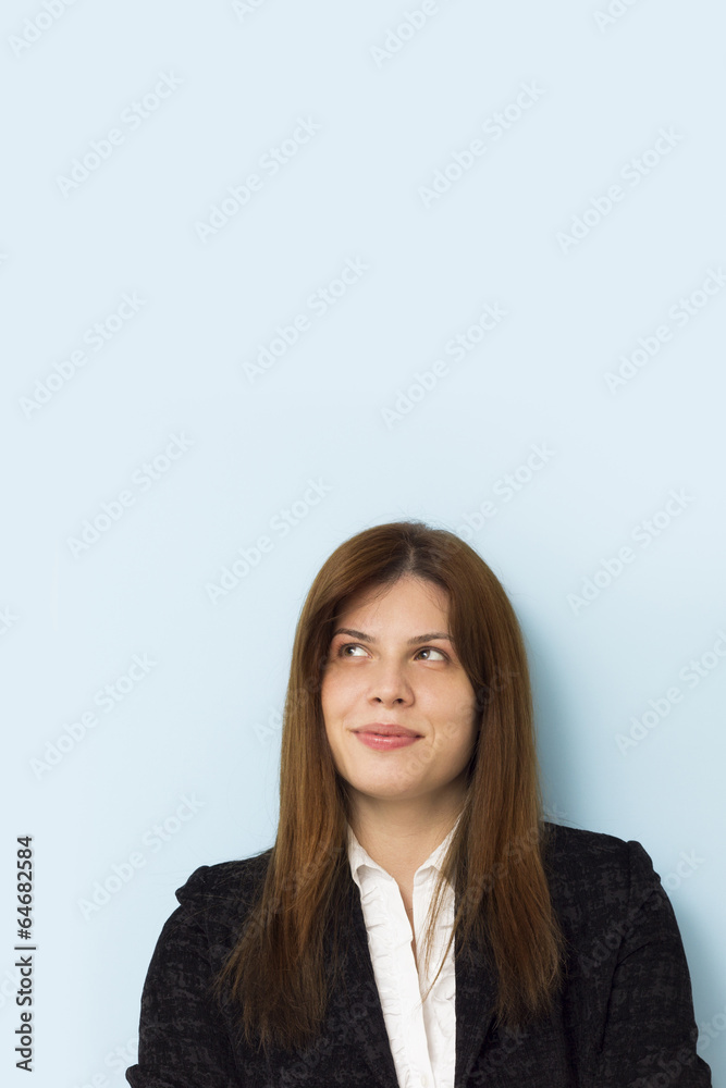 Beautiful business woman smiling with copy space above Beautiful business woman smiling with copy space above