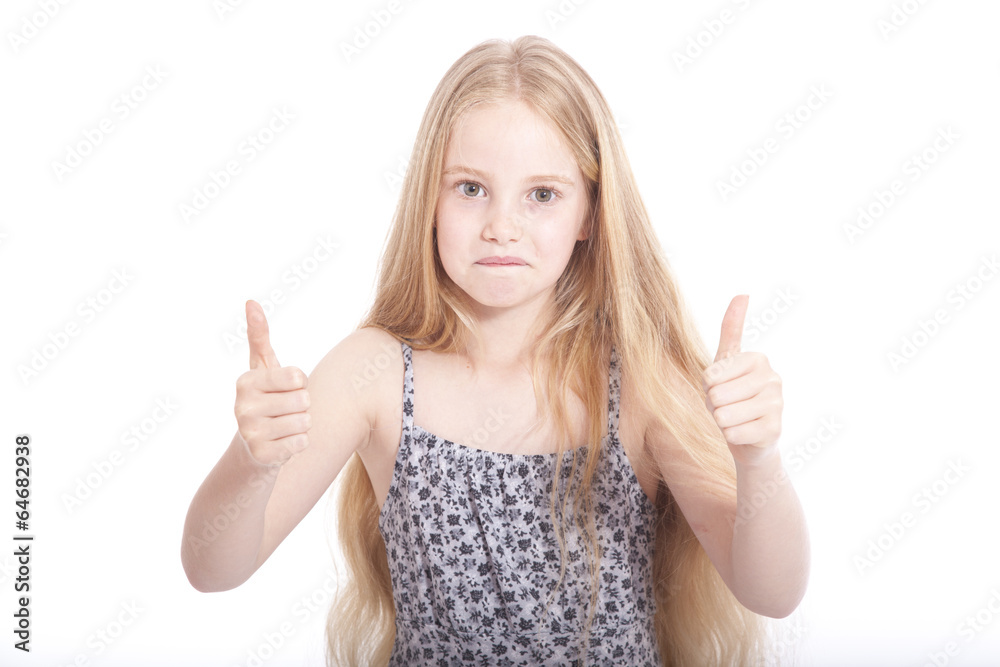 young girl in studio with both thumbs up young girl in studio with both thumbs up