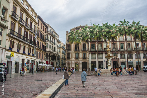 Malaga city in rain, Spain photo