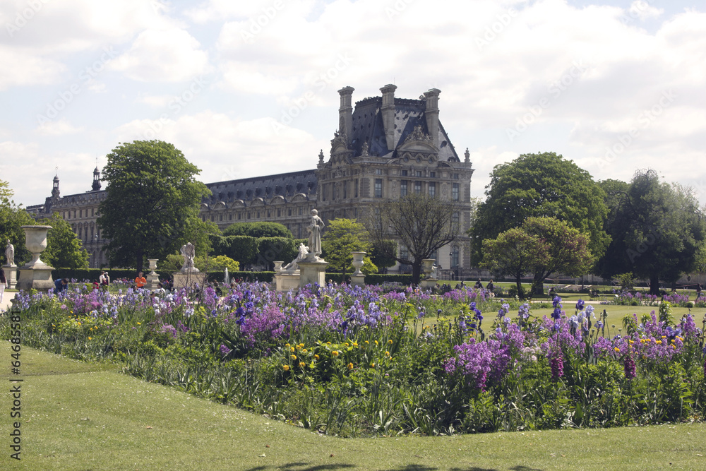 Shot of a park behind the Louvre in Paris with beautiful flowers