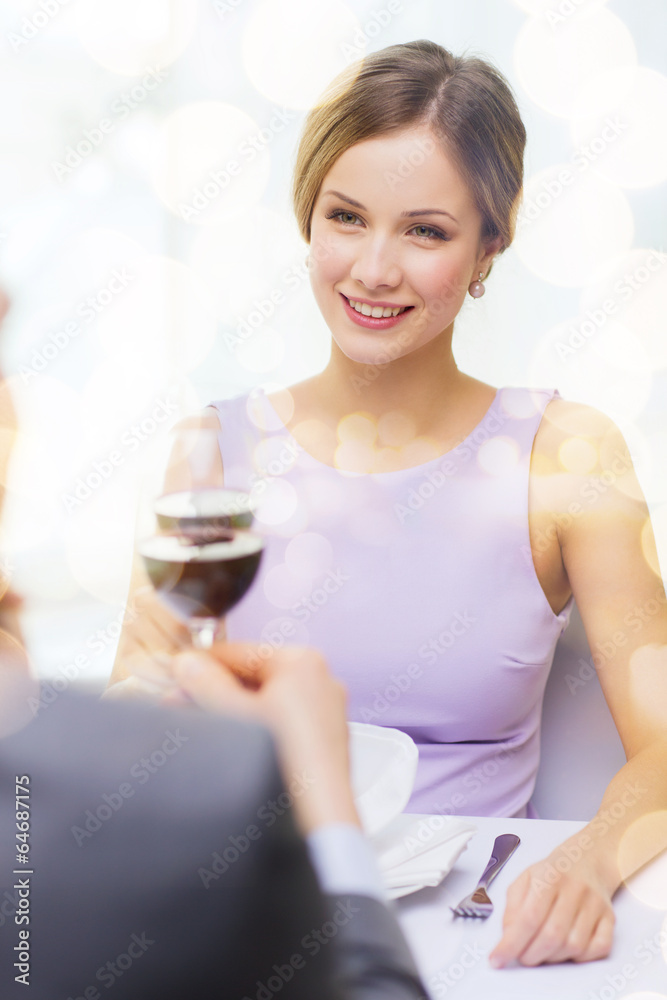 young woman looking at boyfriend or husband young woman looking at boyfriend or husband