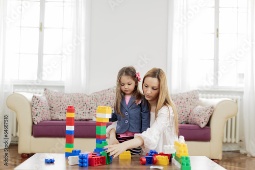 Mother and daughter playing...