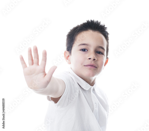 Child showing stop gesture. Isolated on white.