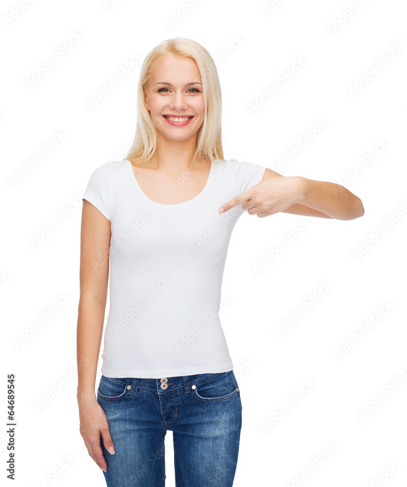 Fototapeta premium smiling young woman in blank white t-shirt
