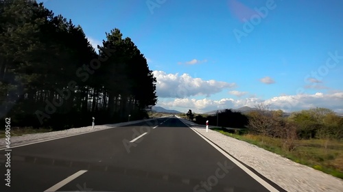Driving a car through the countryside normal speed