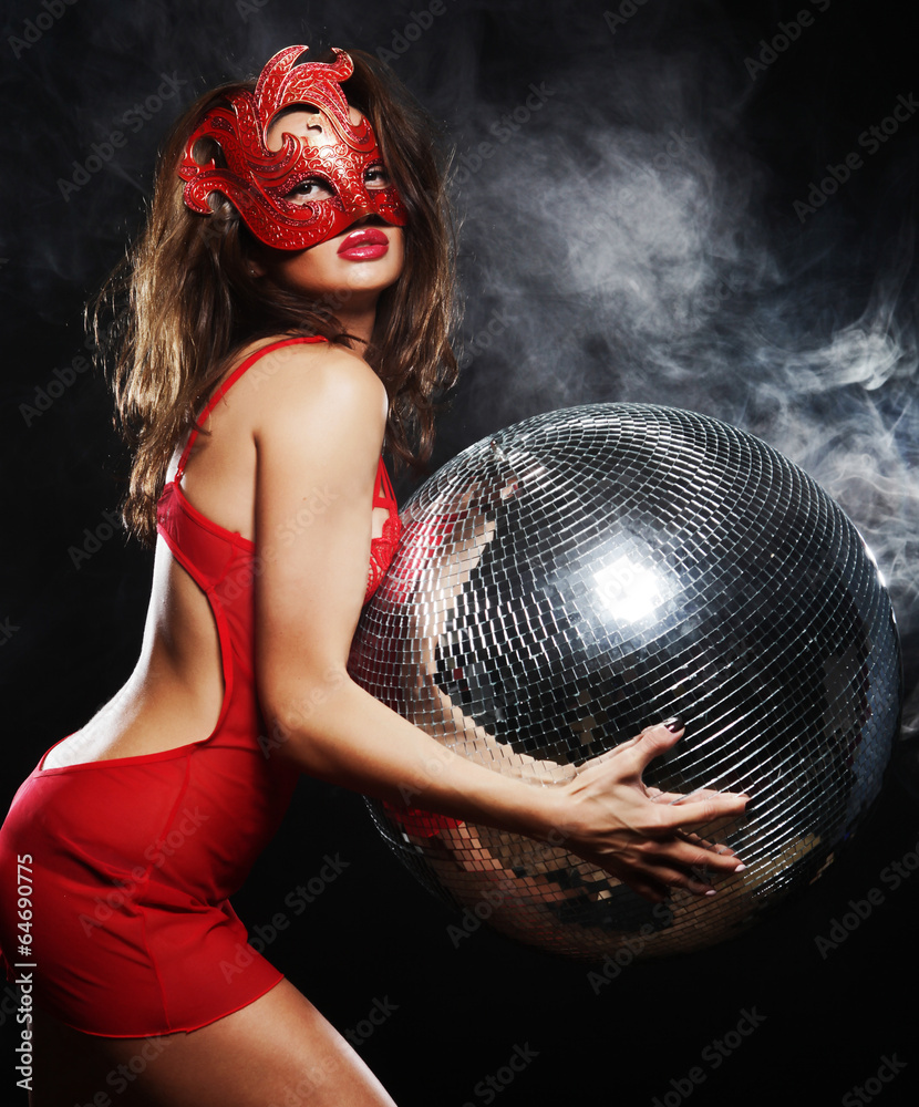 Fototapeta premium lady in mask with disco ball