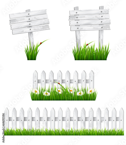 Set of white wooden signs and a fences with grass. Vector.