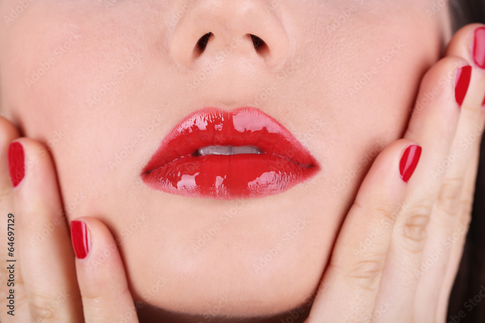 Naklejka premium Red lips and nails closeup