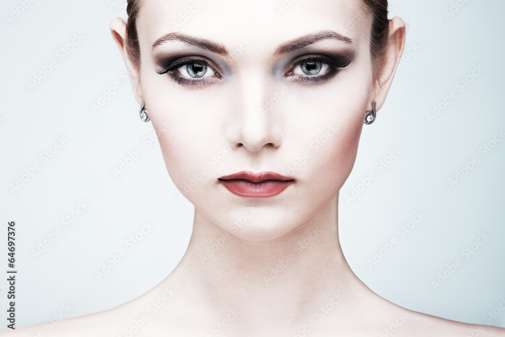 Beautiful  girl, on  a light-grey  background