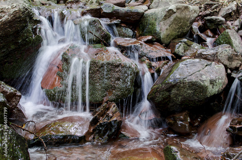 Small cascade on the mountain stream