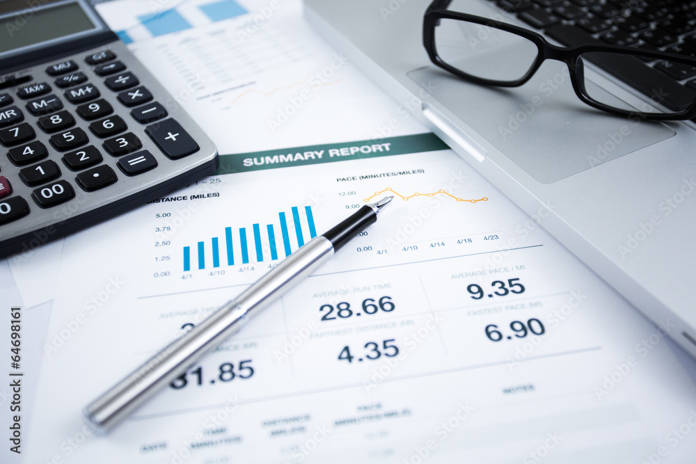Businessman analyzing investment charts with laptop Businessman analyzing investment charts with laptop