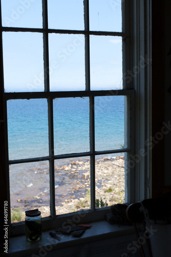 Bay viewed through a window of a house  Georgian Bay  Tobermory 