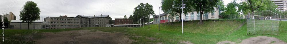 Playground with school in the background, Montreal, Quebec, Cana