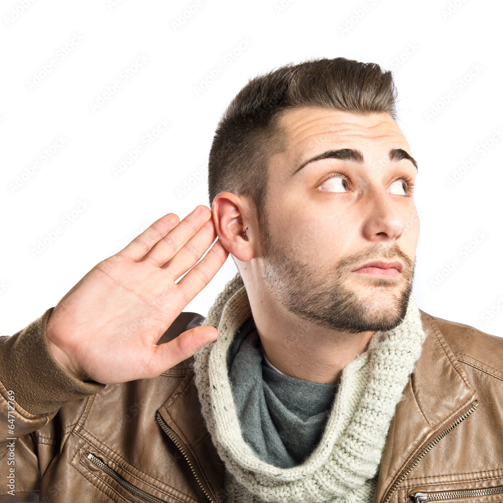 Obraz premium Handsome man hearing something over white background
