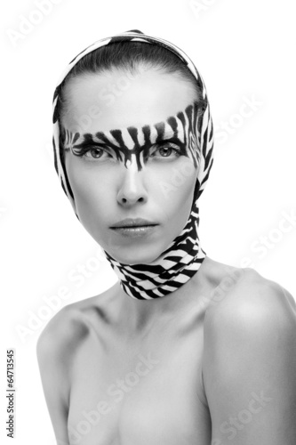 Foto beautiful fashion model in a zebra
