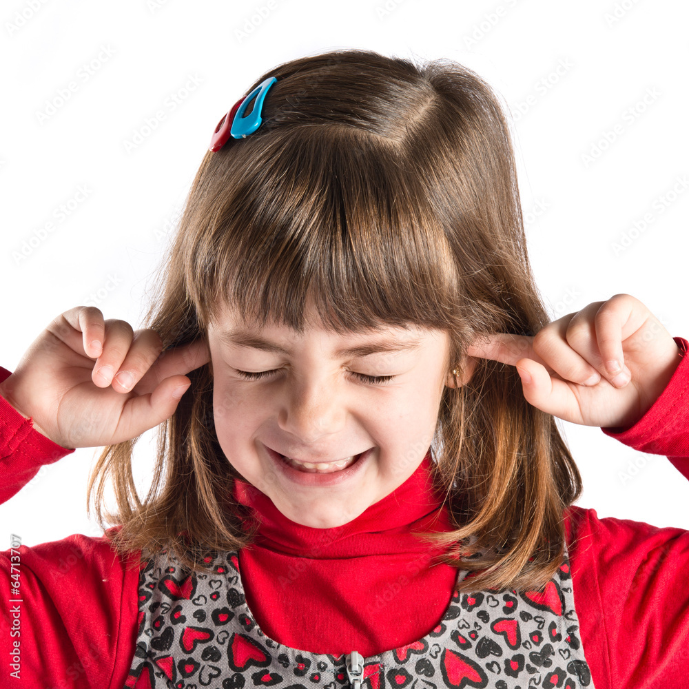 Child covering her ears over white background Child covering her ears over white background
