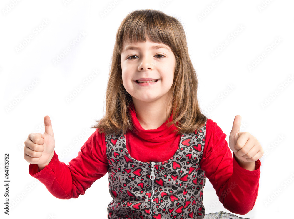 Girl making Ok sign over white background Girl making Ok sign over white background