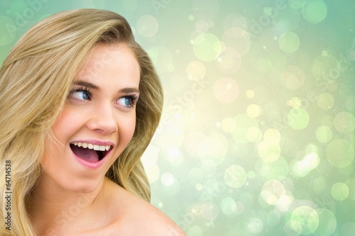 Composite image of smiling blonde natural beauty