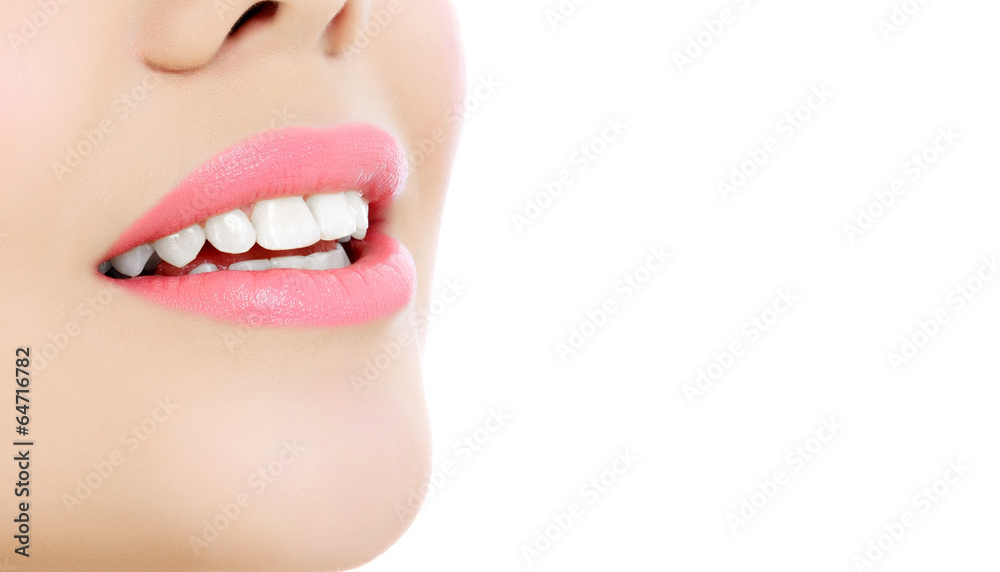 Fototapeta premium Young smiling woman, white background, copyspace