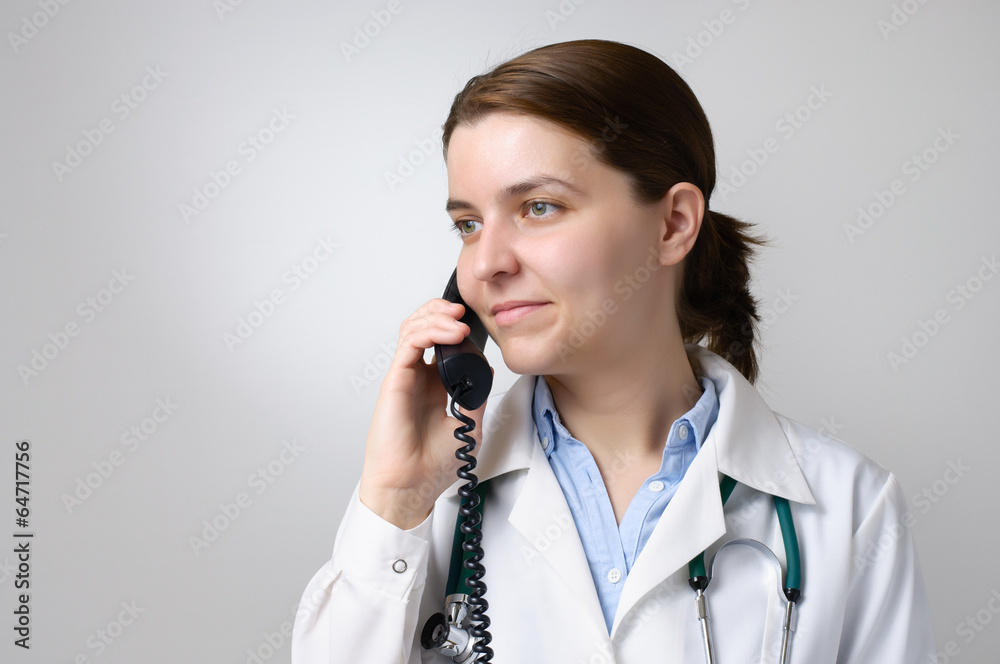 Doctor with telephone