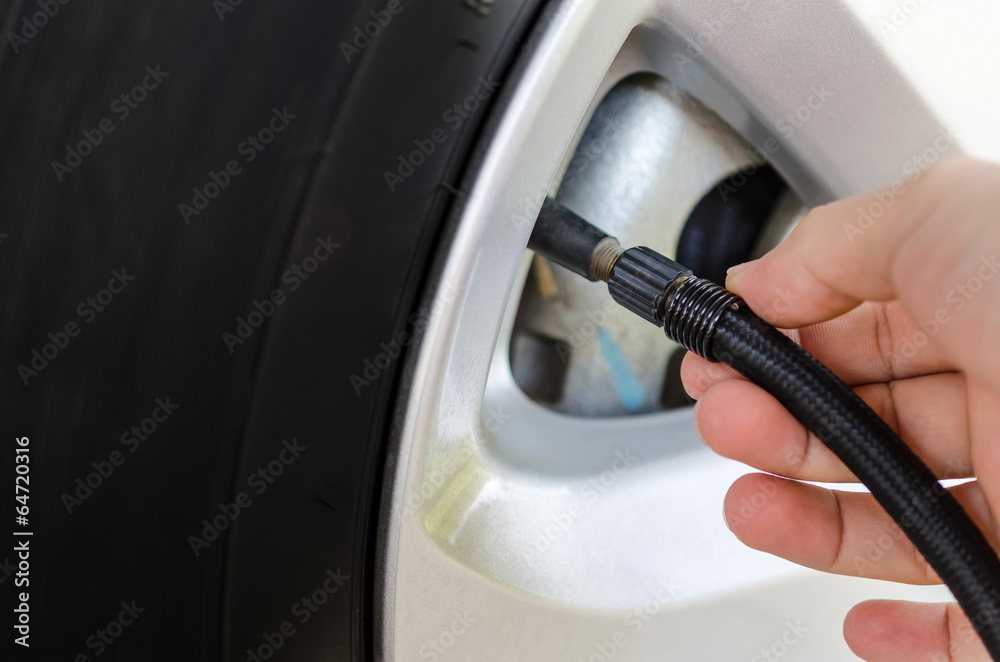 Filling air into a car tire