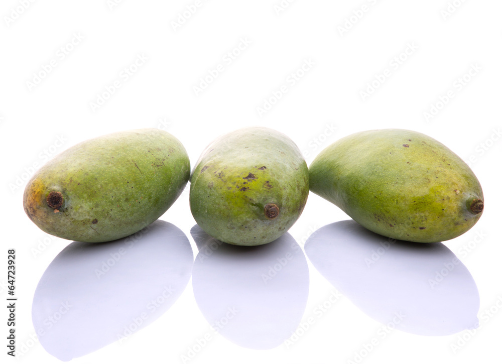 Green mango fruit over white background Green mango fruit over white background