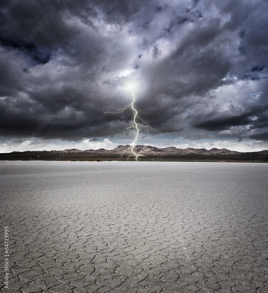 Dry lake bed with storm clouds and lightning - obrazy, fototapety, plakaty 