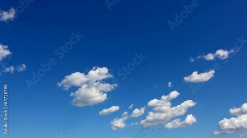 Long time lapse clouds above the sun