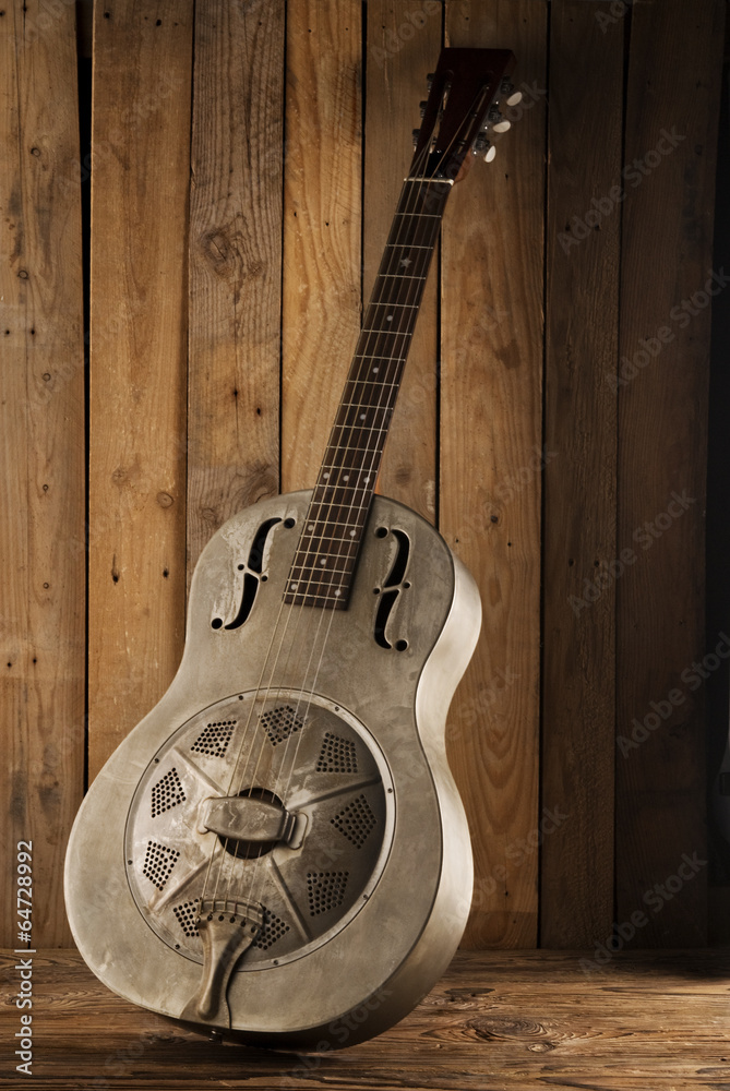 Fototapeta premium blues guitar on wooden background