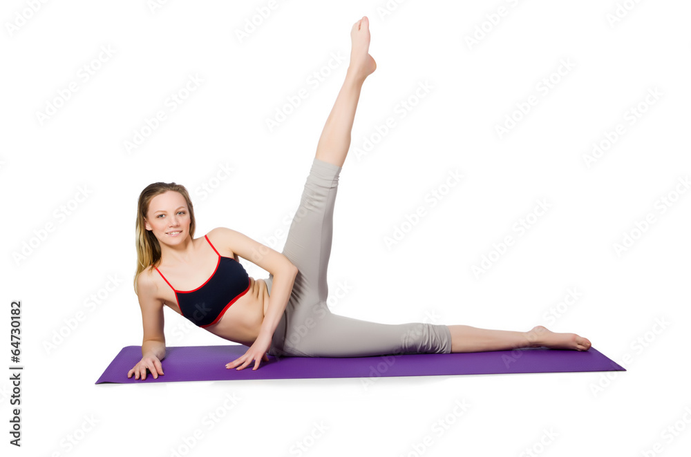 Young female doing exercises on white Young female doing exercises on white
