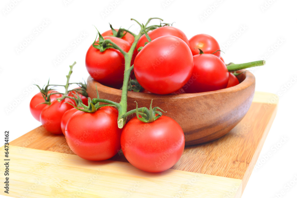 Branch of tomatoes isolated on white background Branch of tomatoes isolated on white background