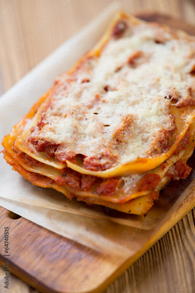Close-up of meat and cheese lasagna, vertical shot