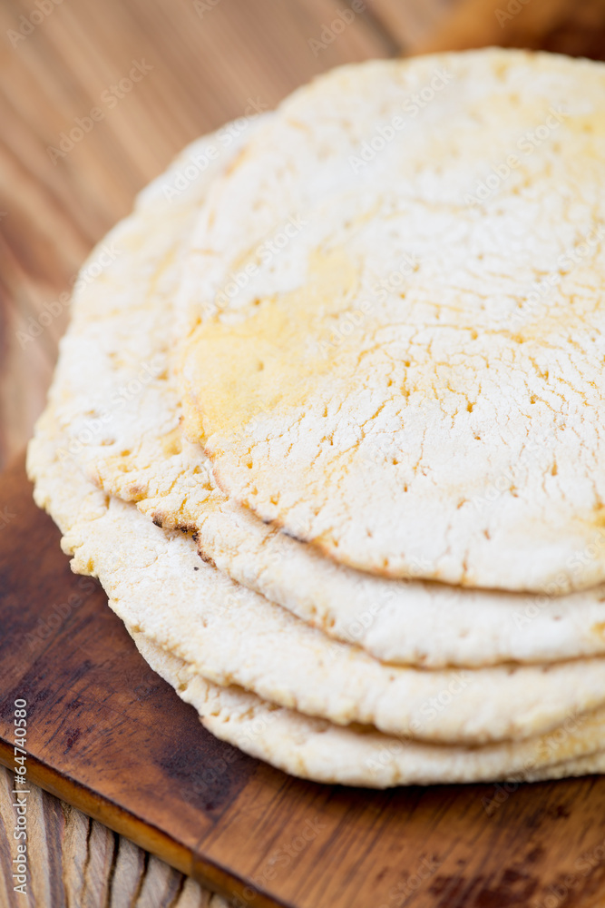 Mexican flatbread - tortillas, vertical shot Mexican flatbread - tortillas, vertical shot