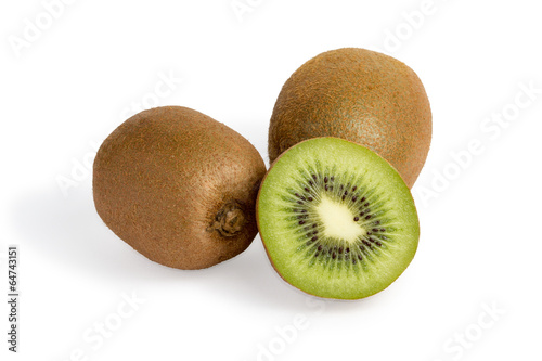 Three isolated kiwi fruits