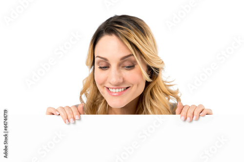 Excited Woman Holding Blank Sign