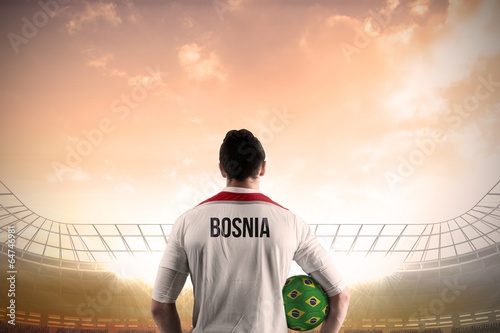 Bosnia football player holding ball © WavebreakmediaMicro