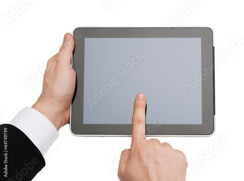 Fototapeta Naklejka Na Ścianę i Meble -  close up of man hands touching tablet pc