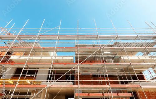 Obraz na plátně Building, construction site in progress to new house, scaffold