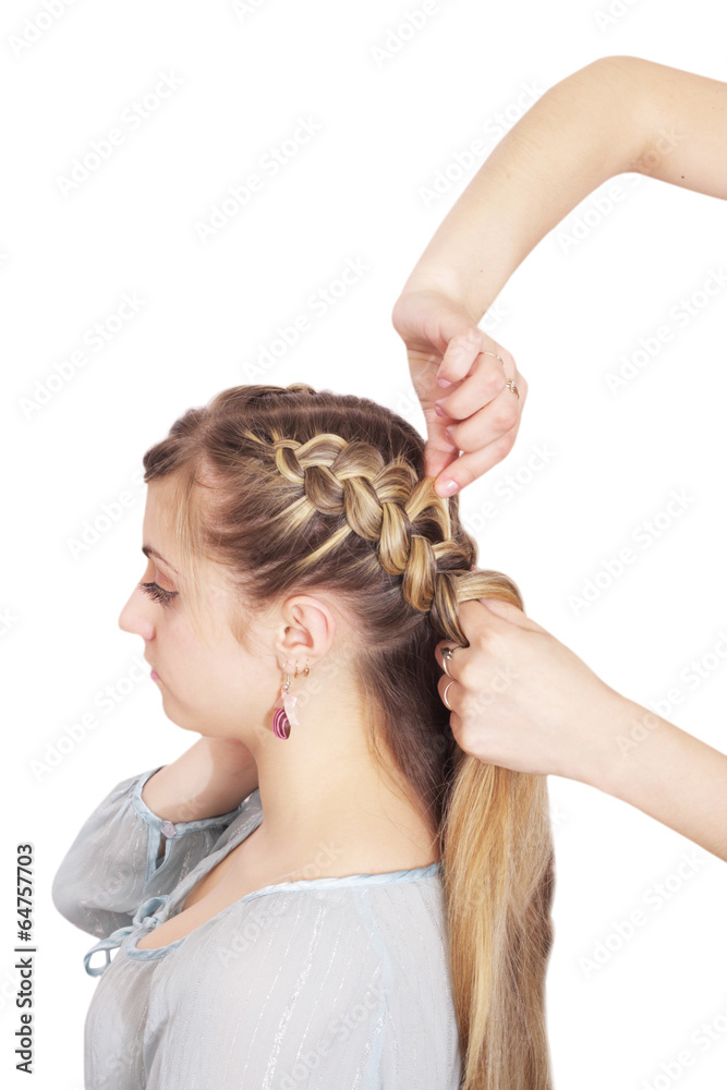 Naklejka premium Braiding. French openwork braid.