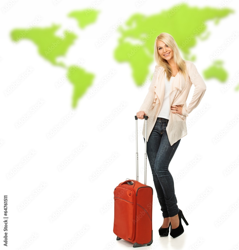 Blond woman with suitcase against world map Blond woman with suitcase against world map