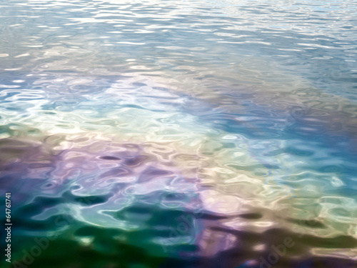 Colourful abstract reflections in water surface