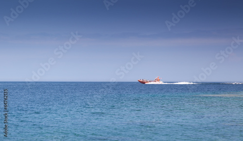 Speedboat moving in a bay, Georgian Bay, Tobermory, Ontario, Can