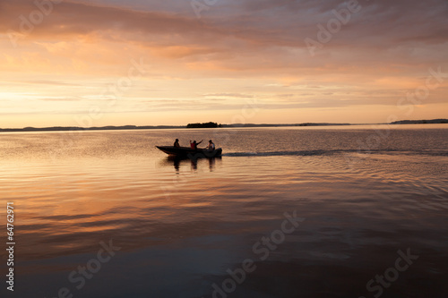 Boat in a bay at sunset, Georgian Bay, Tobermory, Ontario, Canad © bruno135_406