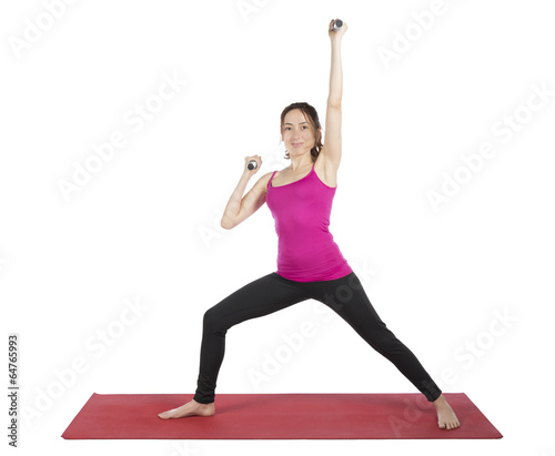 Young fitness woman lifting weights