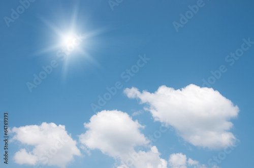 Sun in bright blue sky.