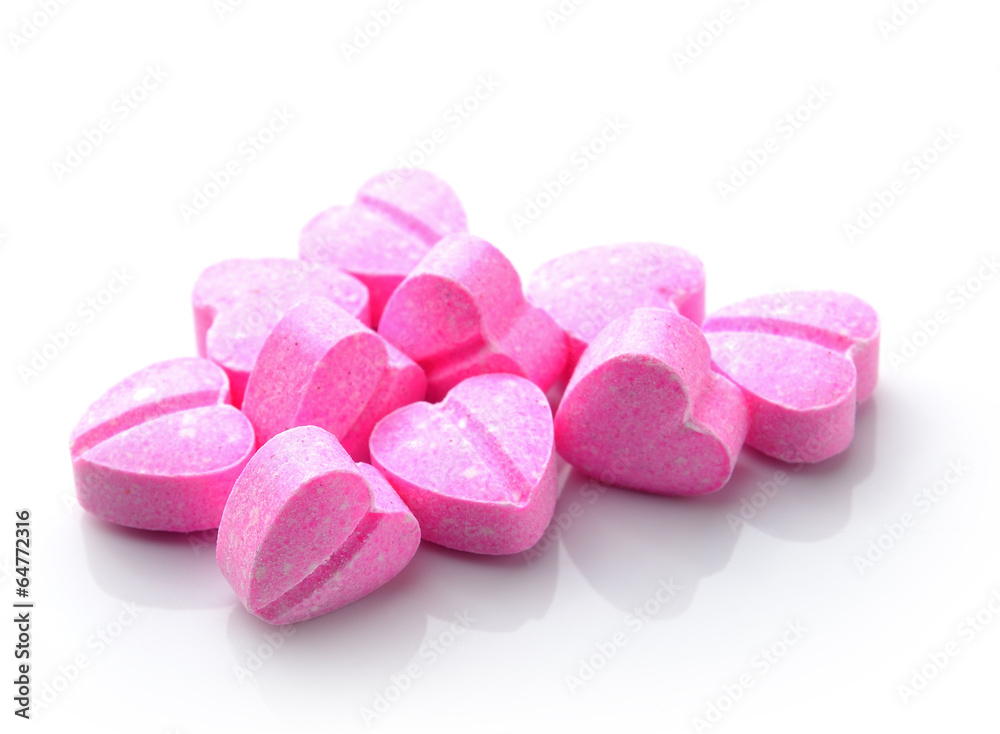 Heart of pills isolated on white background Heart of pills isolated on white background