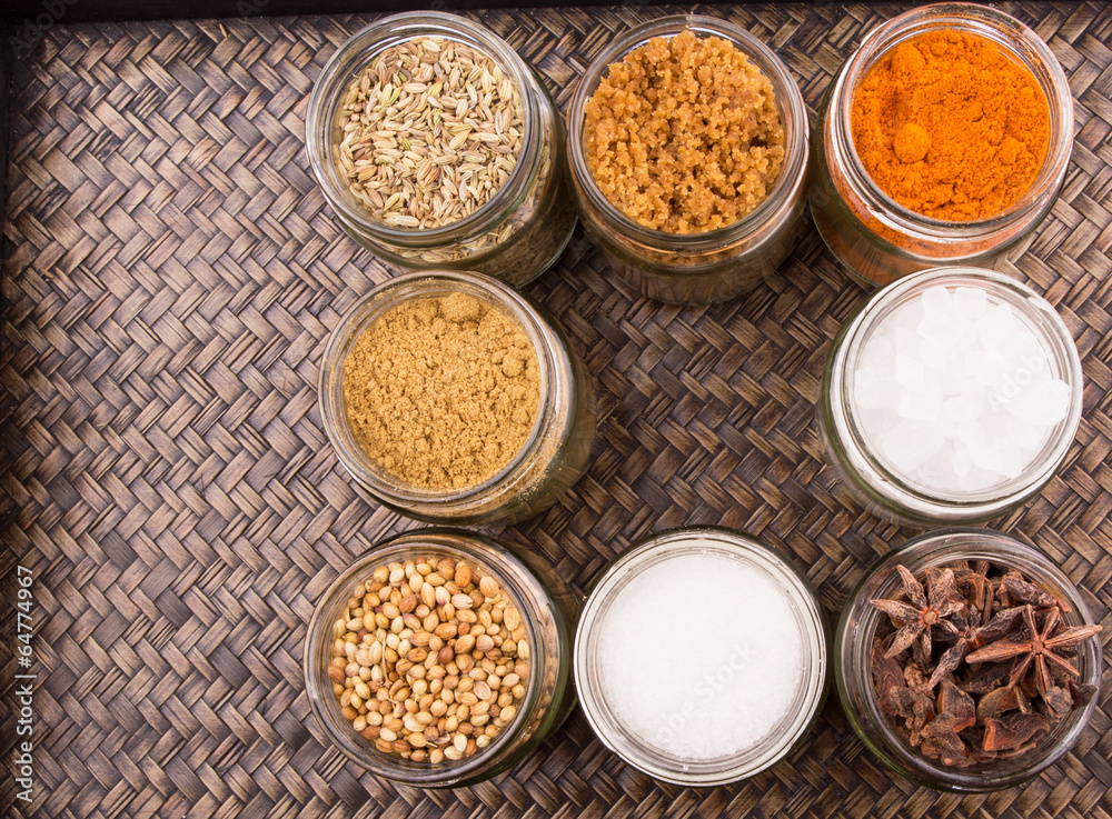Sugar and Spices on a wicker background Sugar and Spices on a wicker background